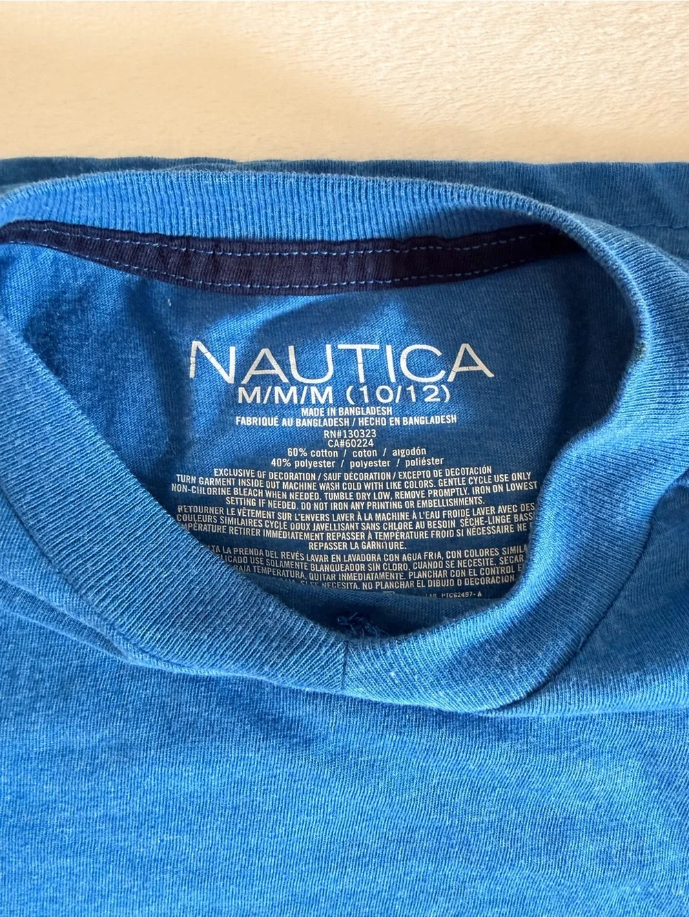 Tommy Bahama Shorts in Light Grey with Nautica blue tee shirt. Youth.